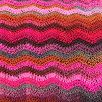 タッセル付きセーター